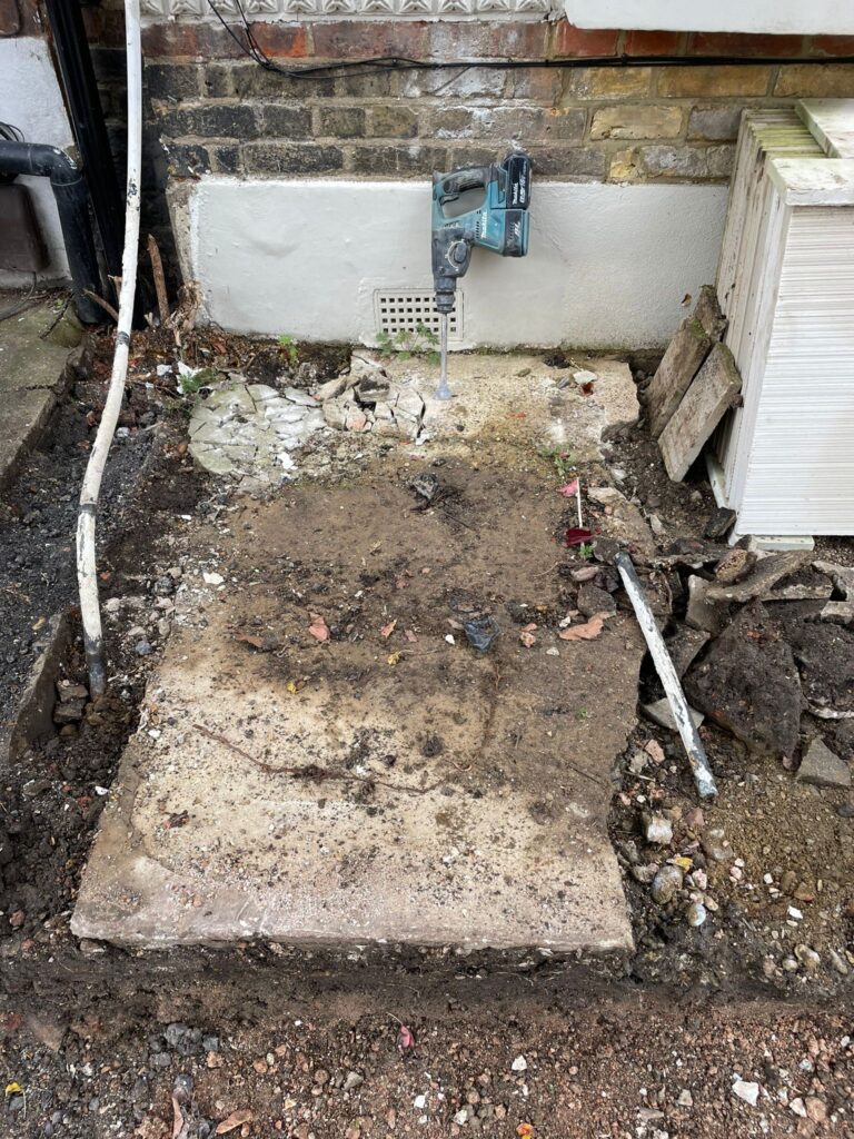 Debris from the demolished front yard wall in Peckham SE15, London