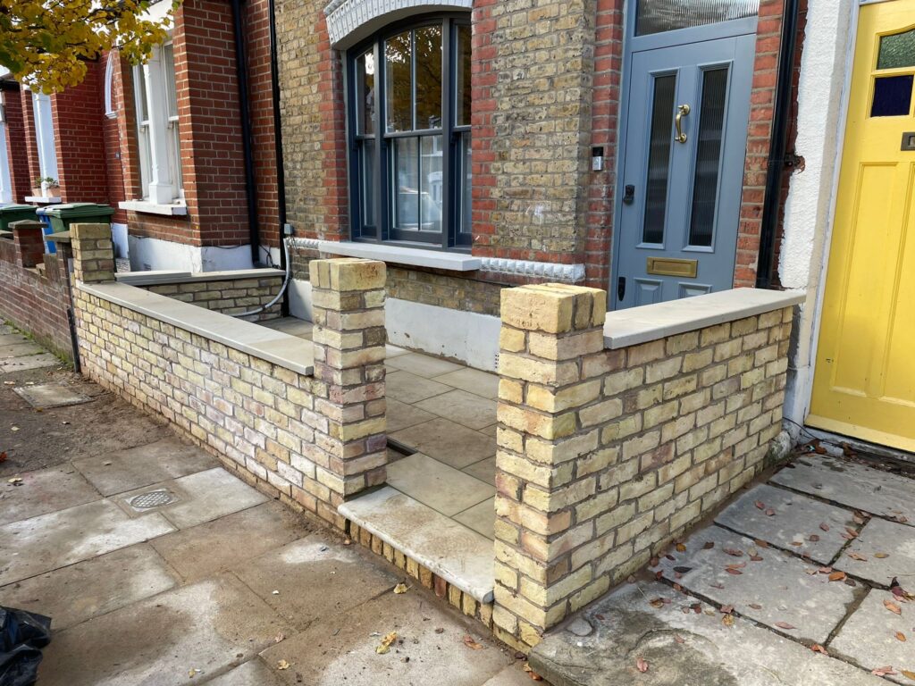 Foundation work for new front yard wall in Peckham SE15, London