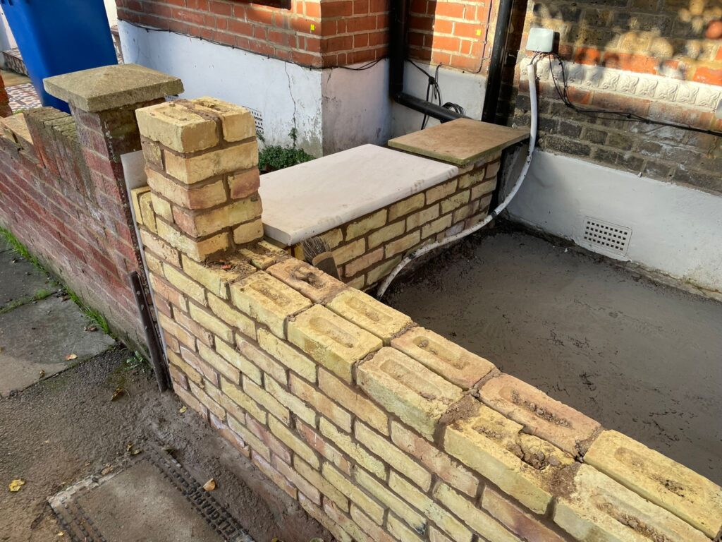 Completed front yard with new wall and landscaping in Peckham SE15, London